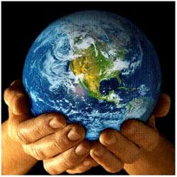 Earth globe held in hands.