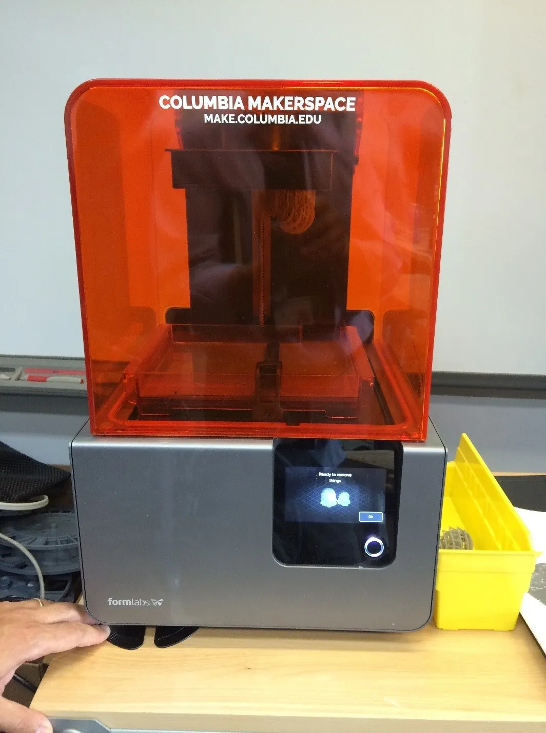 Red screening shown above 3D printer.